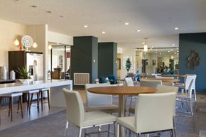 Denver apartment for rent - Kitchen And Dining Area In Clubhouse at Monaco Lakes, Colorado, 80222