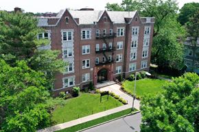 East Orange apartment for rent - an aerial view of a brick building with grass and trees