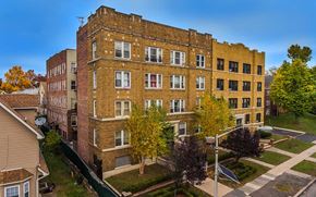 East Orange apartment for rent - an aerial view of an old brick building on a city street