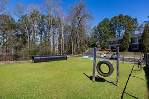 Marietta apartment for rent - a park with a playground and trees in the background