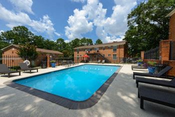 Sparkling swimming pool with sun deck
