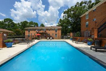 Sparkling swimming pool with sun deck