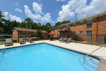 Sparkling swimming pool with sun deck
