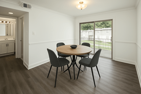 Doraville apartment for rent - A dining room with a round table and four chairs.