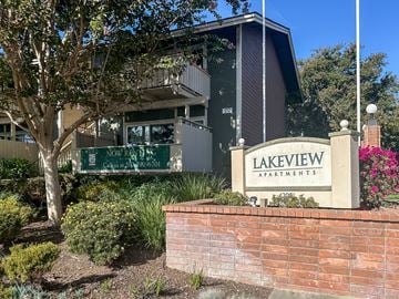 Fremont apartment for rent - A sign for Lakeview Apartments is displayed in front of a building.