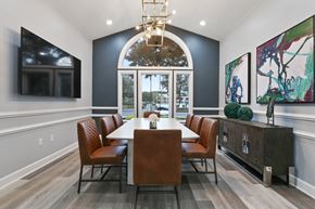 Jacksonville apartment for rent - A dining room with a table and chairs.