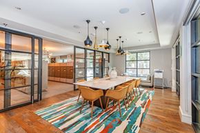 Dallas apartment for rent - A dining room with a white table and chairs.