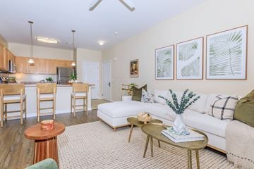 Manchester apartment for rent - A living room with a white couch and a coffee table.