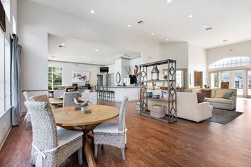 Savannah apartment for rent - A spacious living room with a dining table and chairs.