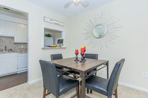 East Hartford apartment for rent - A dining room with a table and chairs.
