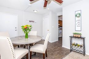 Middletown apartment for rent - A dining room with a round table and chairs.