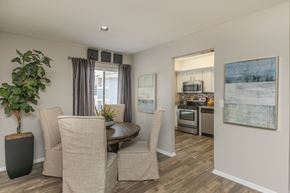 Apopka apartment for rent - A dining room with a round table and chairs.