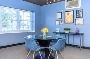 East Haven apartment for rent - A dining room with a table and chairs.