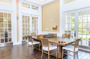 Middletown apartment for rent - A dining room with a wooden table and chairs.
