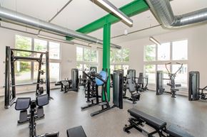 Bloomfield apartment for rent - A gym with a variety of equipment including weights and cardio machines.