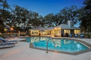 Atlantic Beach apartment for rent - A house with a pool in the backyard.