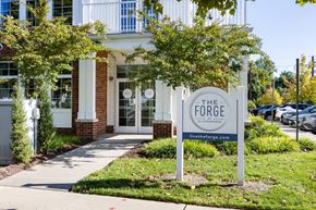 Cliffwood apartment for rent - A sign for The Forge Glassworks is in front of a building.