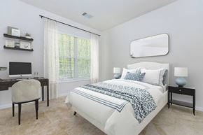 Middletown apartment for rent - A bedroom with a bed, desk, and chair.