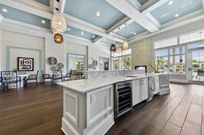 Yulee apartment for rent - A kitchen with a large island and a dining area.