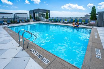 Rooftop heated pool with private cabanas