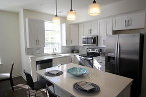 Cliffwood apartment for rent - A kitchen with a table set for two.