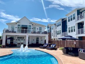 Cliffwood apartment for rent - A pool with a fountain in the middle of it.