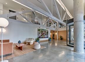 New Jersey apartment for rent - the lobby of a building with a lobby area and a staircase