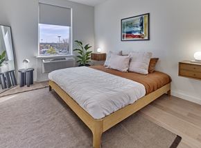 New Jersey apartment for rent - a bedroom with a large bed and a window