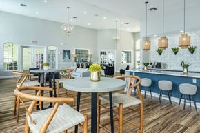 Jacksonville apartment for rent - A dining area with a round table and chairs.