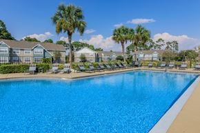 Panama City apartment for rent - A swimming pool in front of a residential area.