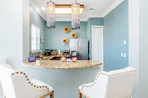 Davenport apartment for rent - A kitchen with a table and two chairs.