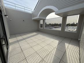 New Haven triplex for rent - A sunny day at the balcony with a view of the beach.