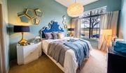Orlando apartment for rent - a blue and white bedroom with a bed and a window at Azul Baldwin Park, Orlando, Florida