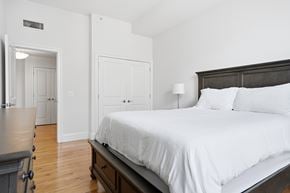 New Haven apartment for rent - A bedroom with a bed, nightstand, and a dresser.