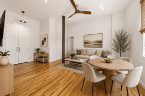 New York apartment for rent - A modern dining room with a round table and chairs.
