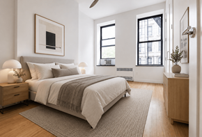 New York apartment for rent - A bedroom with a large bed and a window.