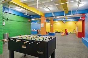 New Haven apartment for rent - A black pool table with the word "Clue" written on it.