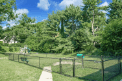 Baltimore apartment for rent - a park with a fenced in area and trees