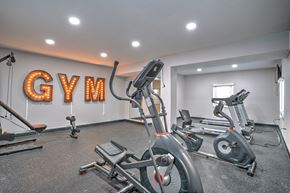 Baltimore apartment for rent - the gym at the flats at big tex apartments