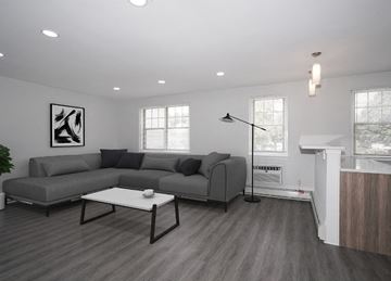 Baltimore apartment for rent - a living room with a couch and a coffee table