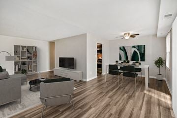 Windsor Mill apartment for rent - a living room with couches and a table and a tv