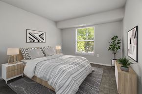 Baltimore townhouse for rent - an open bedroom with a bed and a window