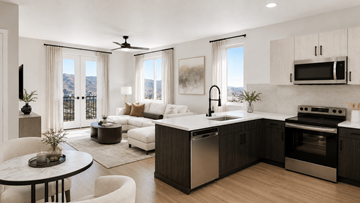 Henderson apartment for rent - A modern kitchen with a dining table and a living room area.