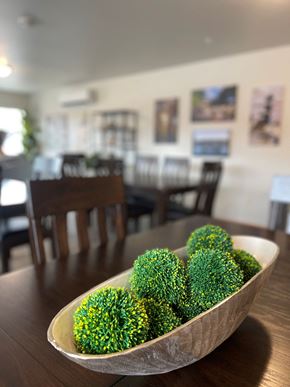 New Richmond apartment for rent - A bowl of green and yellow food sits on a wooden table.
