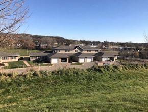 Chatfield apartment for rent - A residential area with houses and greenery.