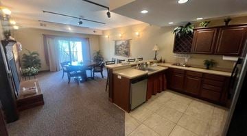 Winona apartment for rent - A kitchen with brown cabinets and a white countertop.