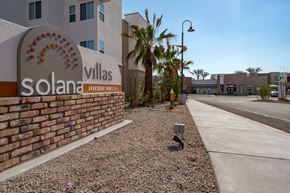 Buckeye apartment for rent - A sign for Solana Villas Apartment Homes is shown in front of a building.