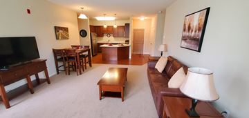 Williston apartment for rent - a living room with a couch and a table