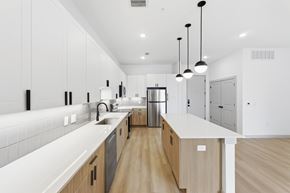Austin apartment for rent - Large modern kitchens with underlit cabinetry at Wixby House in Austin, Texas.