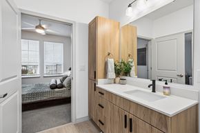 Farmers Branch apartment for rent - Contemporary apartment bathroom at The Elara in Farmers Branch, TX showcasing clean lines and stylish finishes near Dallas, TX